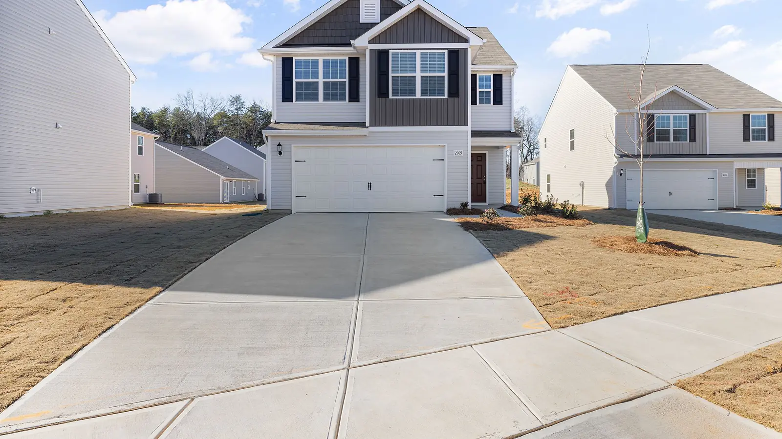 New poured concrete driveway and sidewalk at a residential home